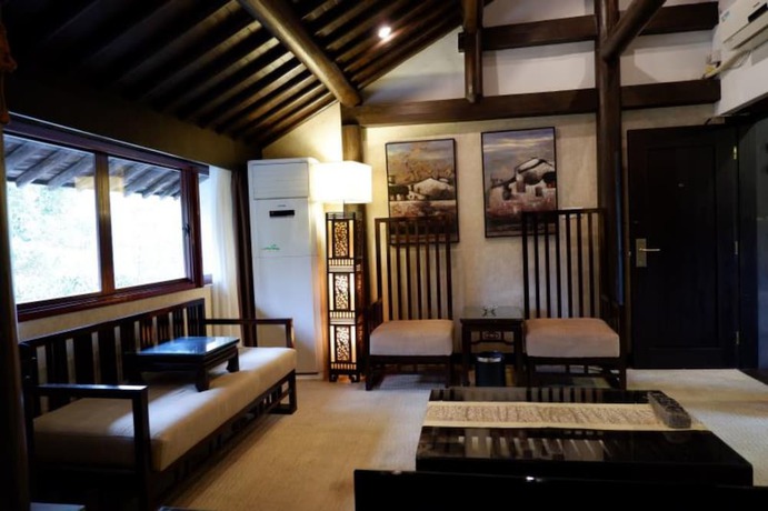 Imagen de la habitación del Hotel Hangzhou Xixi Bieyuan Resort. Foto 8