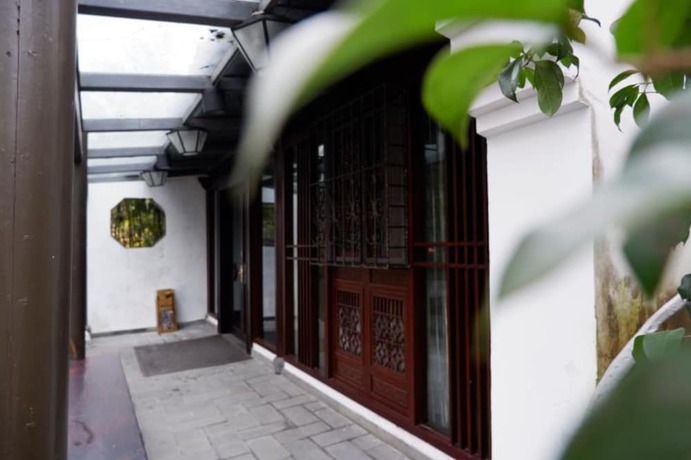 Imagen de los exteriores del Hotel Hangzhou Xixi Bieyuan Resort. Foto 10