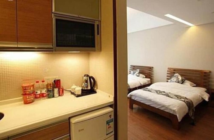 Imagen de la habitación del Hotel Hangzhou Yilin Apartment. Foto 15