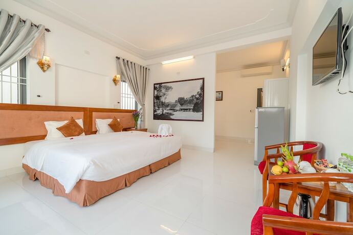 Imagen de la habitación del Hotel Hanh Nhung Villa. Foto 11