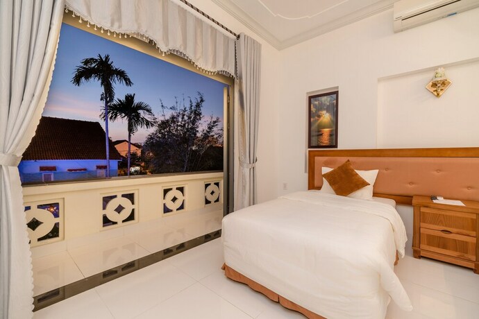 Imagen de la habitación del Hotel Hanh Nhung Villa. Foto 13