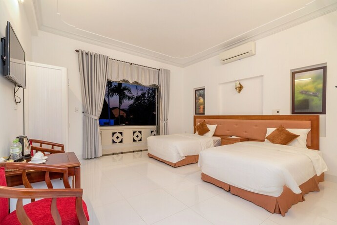 Imagen de la habitación del Hotel Hanh Nhung Villa. Foto 14