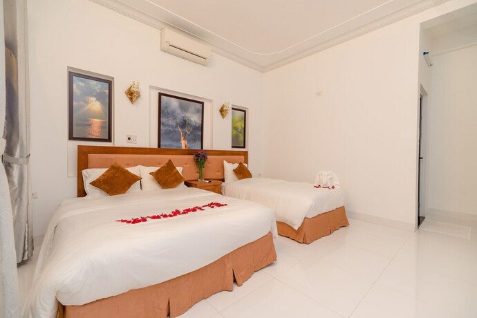 Imagen de la habitación del Hotel Hanh Nhung Villa. Foto 21