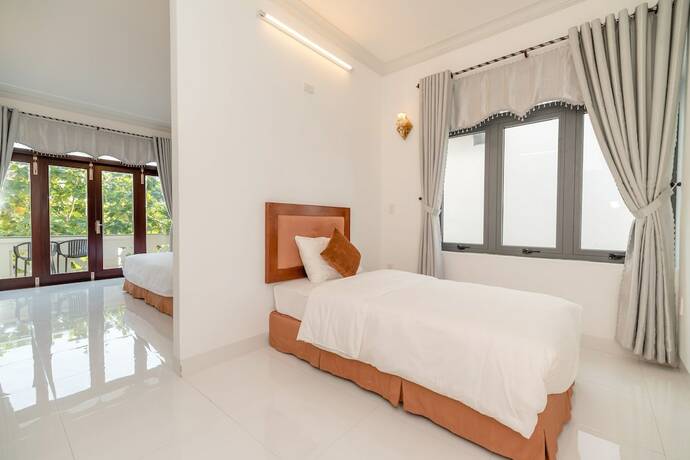 Imagen de la habitación del Hotel Hanh Nhung Villa. Foto 22