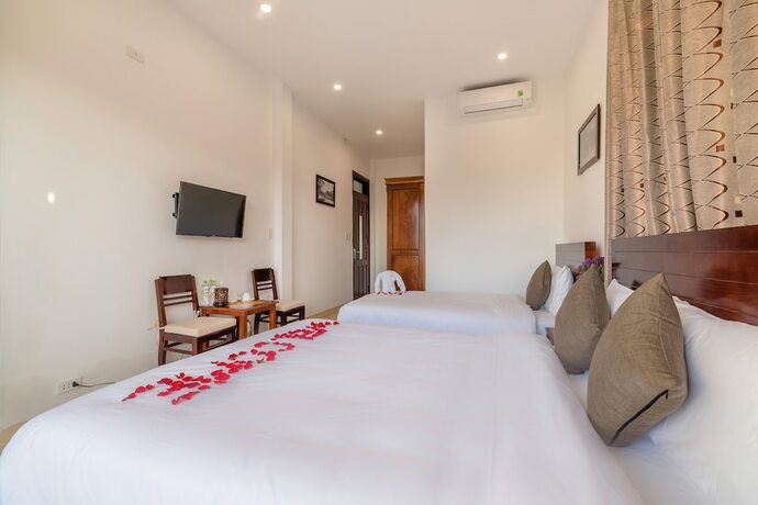 Imagen de la habitación del Hotel Hanh Nhung Villa. Foto 24