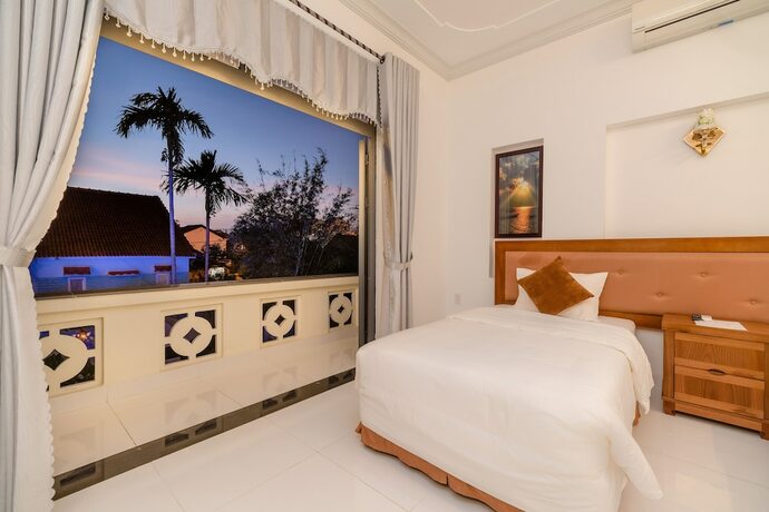 Imagen de la habitación del Hotel Hanh Nhung Villa. Foto 26
