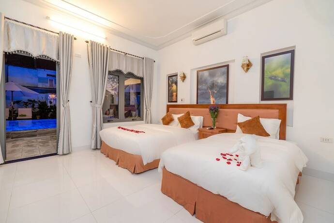 Imagen de la habitación del Hotel Hanh Nhung Villa. Foto 27