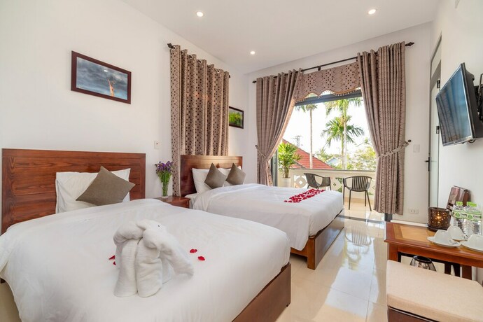 Imagen de la habitación del Hotel Hanh Nhung Villa. Foto 28