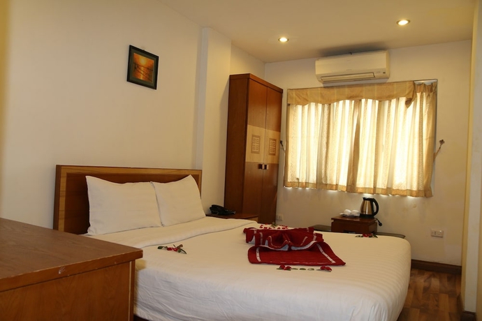 Imagen de la habitación del Hotel Hanoi Charming House. Foto 10