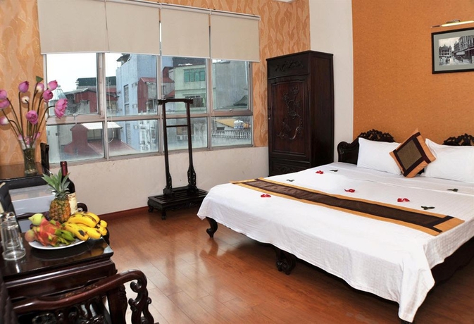 Imagen de la habitación del Hotel Hanoi City Guest House. Foto 4