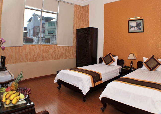 Imagen de la habitación del Hotel Hanoi City Guest House. Foto 6