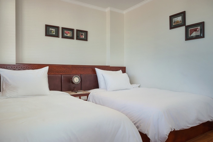 Imagen de la habitación del Hotel Hanoi E Central. Foto 12