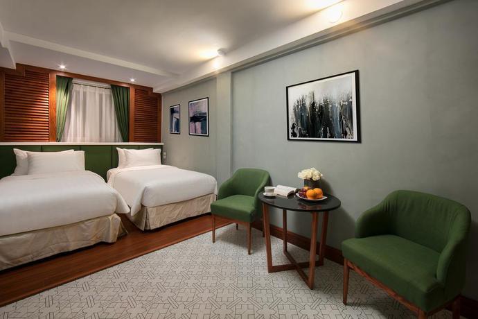 Imagen de la habitación del Hotel Hanoi La Selva Central. Foto 2
