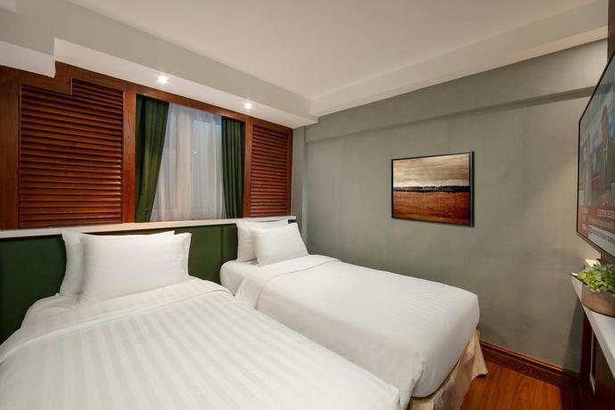 Imagen de la habitación del Hotel Hanoi La Selva Central. Foto 9