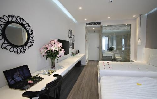 Imagen de la habitación del Hotel Hanoi Ping Luxury. Foto 7