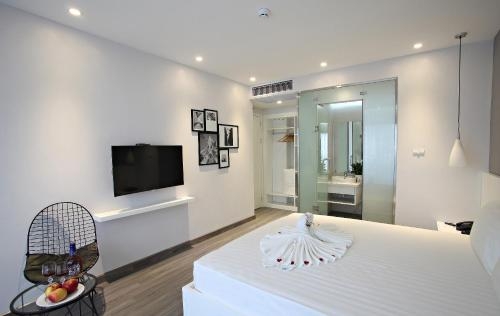 Imagen de la habitación del Hotel Hanoi Ping Luxury. Foto 8