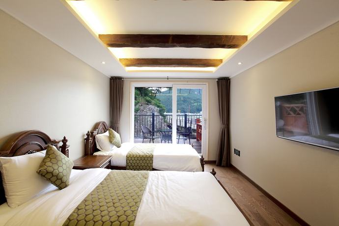 Imagen de la habitación del Hotel Hansan Marina and Resort. Foto 12