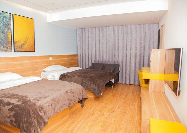 Imagen de la habitación del Hotel Hansand Casa Ai Service Apartment. Foto 20