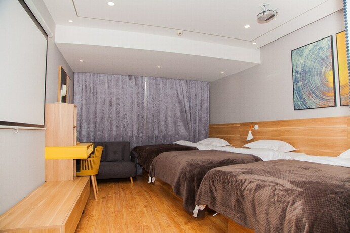 Imagen de la habitación del Hotel Hansand Casa Ai Service Apartment. Foto 22