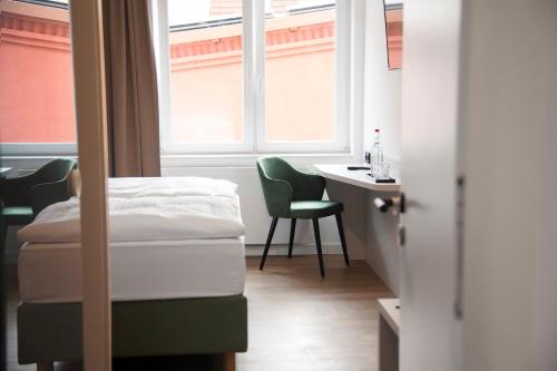 Imagen de la habitación del Hotel Hanse House Wismar. Foto 15