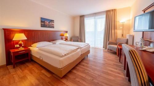 Imagen de la habitación del Hotel Hanseatischer Hof, Lubeck. Foto 18