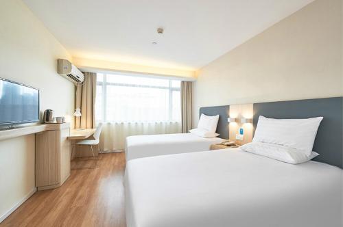 Imagen general del Hotel Hanting Cangzhou Qiantong Park. Foto 2