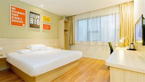 Imagen de la habitación del Hotel Hanting Express Beijing Niujie. Foto 1