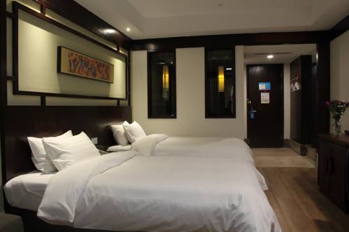 Imagen de la habitación del Hotel Hanting Express Hangzhou Thousand Island Lake Cent. Foto 2