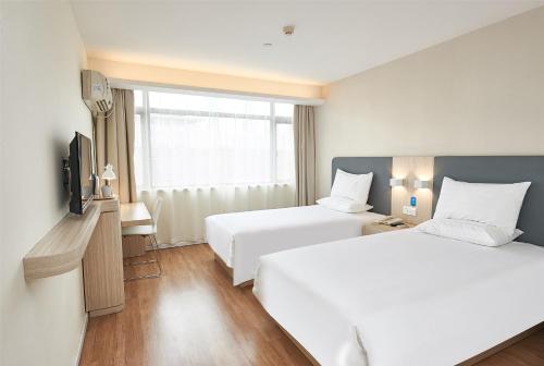 Imagen de la habitación del Hotel Hanting Express Harbin Convention Center Zhujiang. Foto 7