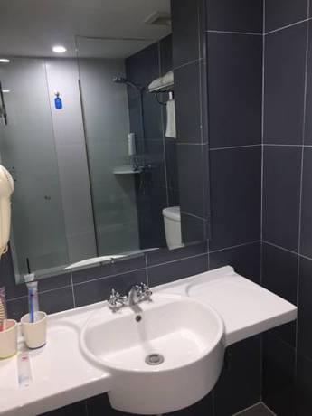 Imagen de la habitación del Hotel Hanting Express Harbin Railway Station Square. Foto 7