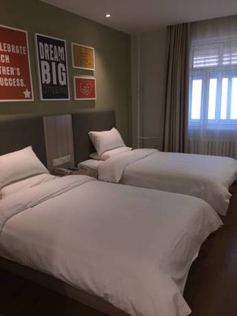 Imagen de la habitación del Hotel Hanting Express Harbin Railway Station Square. Foto 8