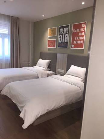 Imagen de la habitación del Hotel Hanting Express Harbin Railway Station Square. Foto 9