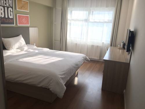 Imagen de la habitación del Hotel Hanting Express Harbin Railway Station Square. Foto 12