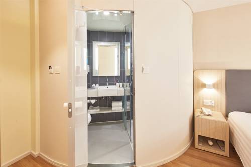 Imagen de la habitación del Hotel Hanting Express Huaihua Statium. Foto 2