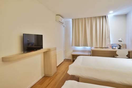 Imagen de la habitación del Hotel Hanting Express Ji'nan Quancheng Square. Foto 2
