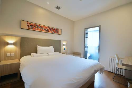 Imagen de la habitación del Hotel Hanting Express Ji'nan Quancheng Square. Foto 5