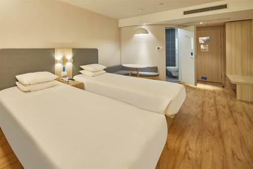 Imagen de la habitación del Hotel Hanting Express Rudong Wenfeng World. Foto 4