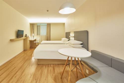 Imagen de la habitación del Hotel Hanting Express Shanghai Guilin Road. Foto 3