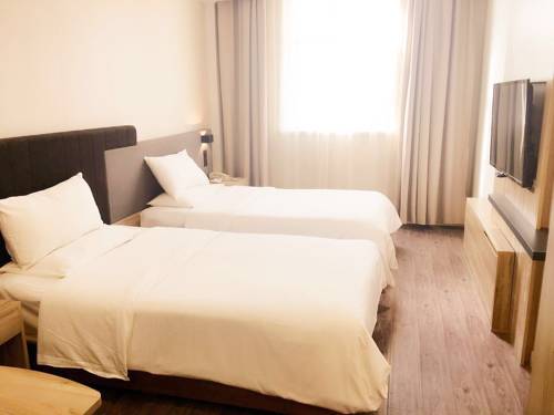 Imagen de la habitación del Hotel Hanting Express Shanghai Hongkou Football Stadium. Foto 4