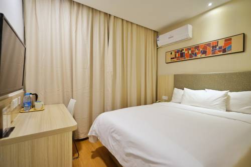 Imagen de la habitación del Hotel Hanting Express Shanghai Xiangyang Road. Foto 2
