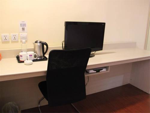 Imagen de la habitación del Hotel Hanting Express Shanghai Xinjinqiao. Foto 9