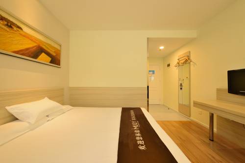 Imagen de la habitación del Hotel Hanting Express Shanghai Xujiahui. Foto 1