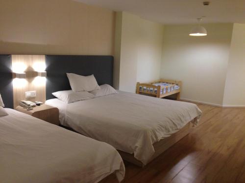 Imagen general del Hotel Hanting Express Shanghai Zhoupu Yigu. Foto 3