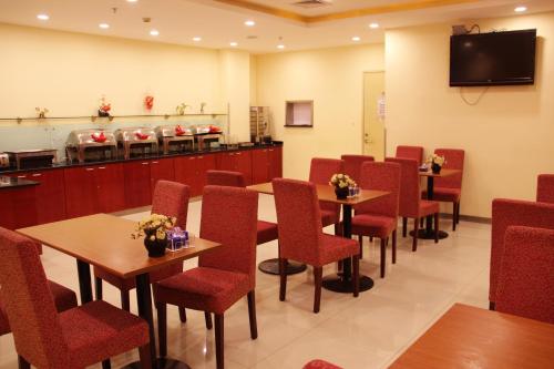 Imagen del bar/restaurante del Hotel Hanting Express Taizhou Jiangyan Avenue. Foto 2