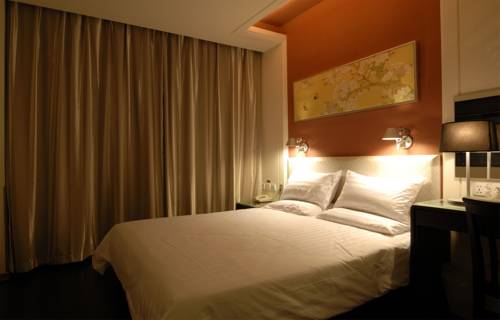 Imagen de la habitación del Hotel Hanting Express Tianjin Tonglou. Foto 3