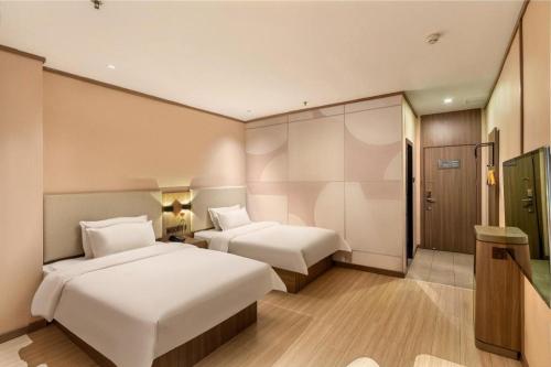 Imagen general del Hotel Hanting Guangzhou North Railway Station. Foto 12