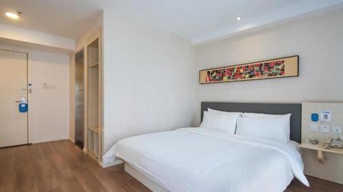 Imagen general del Hotel Hanting Hotel Nanjing Jiangpu Longhua Road Metro Station. Foto 3