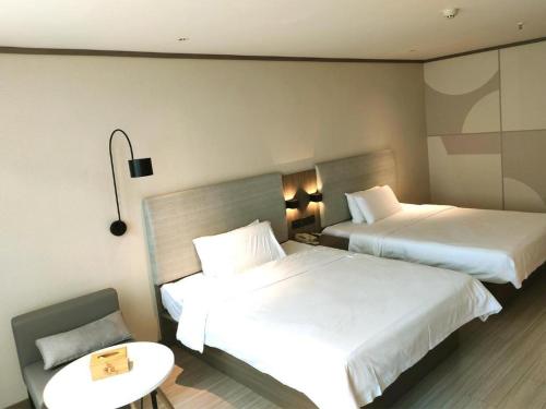 Imagen general del Hotel Hanting Hotel Yancheng Funing Shanghai Road. Foto 13
