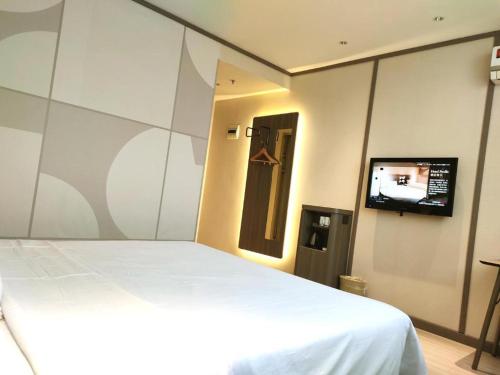 Imagen general del Hotel Hanting Hotel Yancheng Funing Shanghai Road. Foto 18