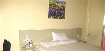 Imagen de la habitación del Hotel Hanting Inn Exhibition Center - Changchun. Foto 4